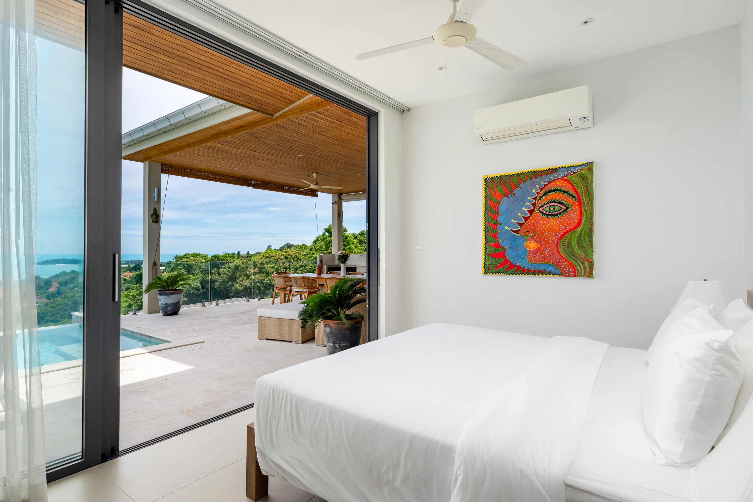 A main bedroom opening toward the terrace